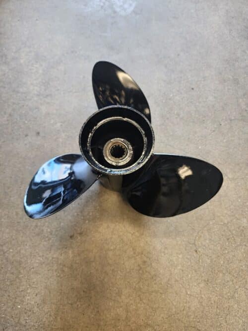 Used 12.25 X 15 3 Blade Stainless Steel, Evinrude Painted, 13 tooth